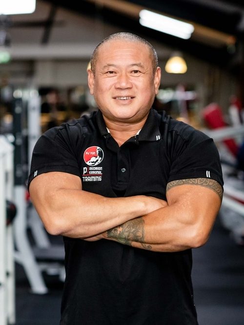 PJ Yun standing in the gym